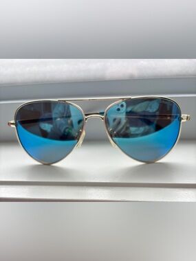 Polaroid Sunglasses with Blue Mirror Polarized Lenses - Aviator Shape - Gold
